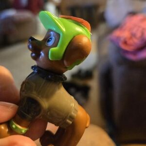Paw Patrol Action Figure with Green Helmet and Brown Fur